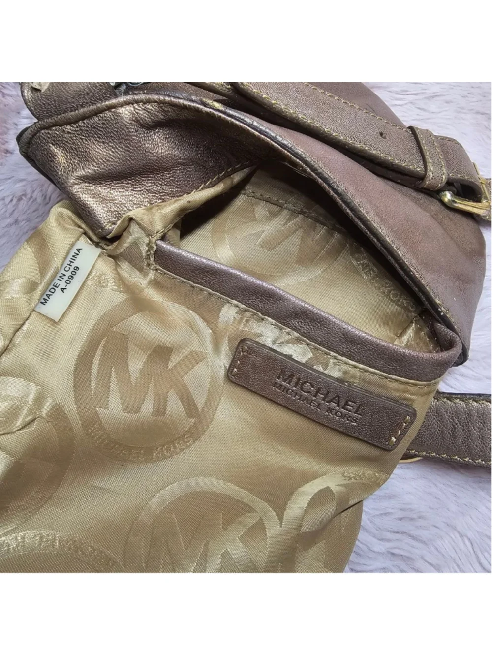Michael Kors Metallic Gold Leather Crossbody Bag with Braided Tassel Accent